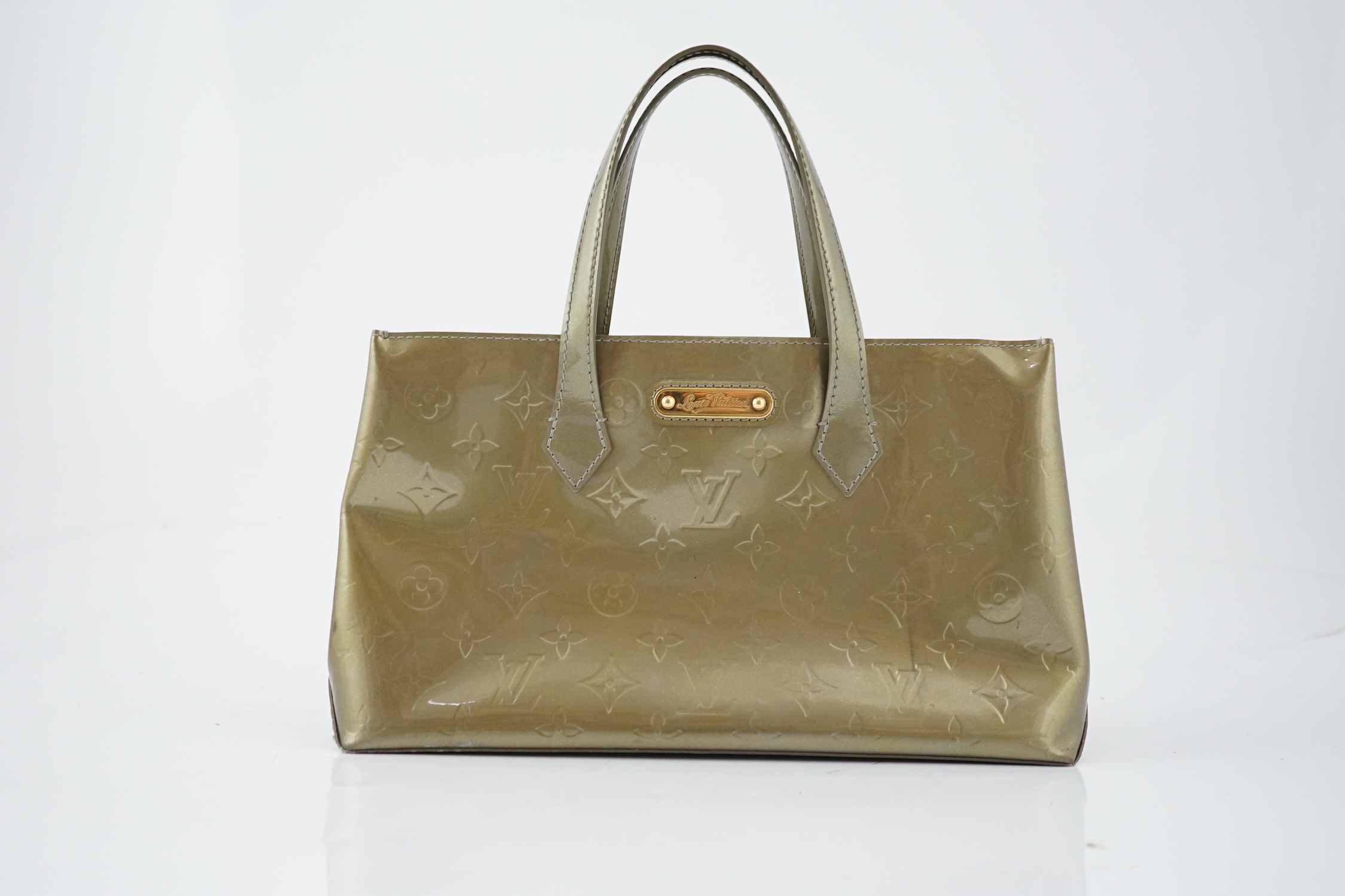 A Louis Vuitton gold metallic monogram tote bag, height 18cm, height to handle 29cm, width 31cm, depth 11.5cm